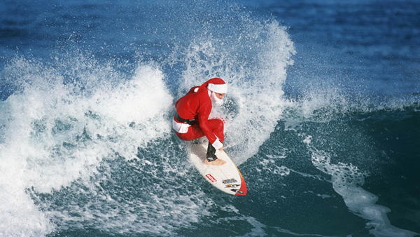 waves-surfing-Santa